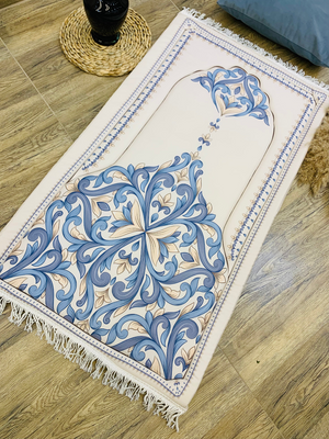 Decorative rug with blue and beige patterns on a wooden floor.